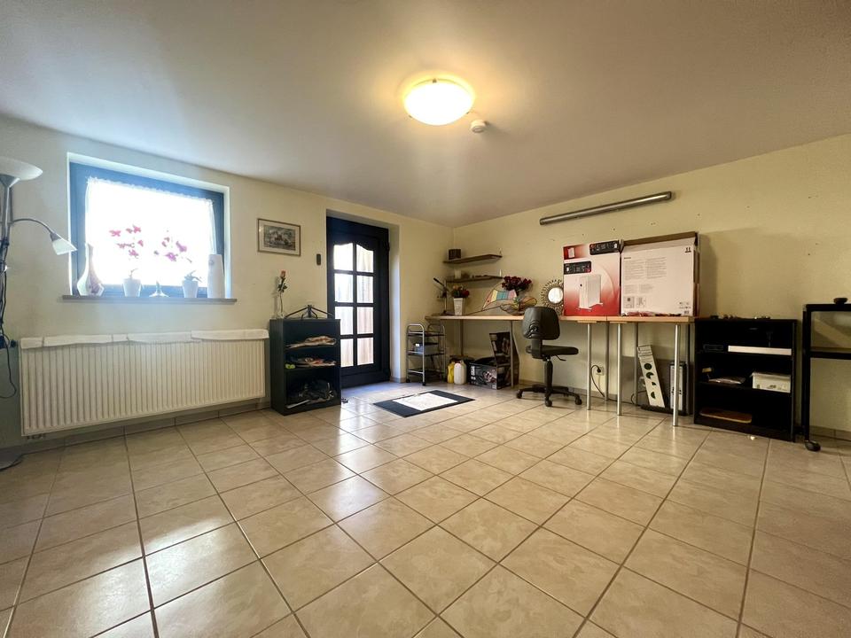 Gepflegtes Einfamilienhaus mit Einliegerwohnung in schöner Waldrandlage – Bild 27