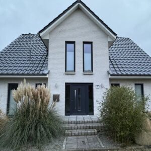 Charmantes Einfamilienhaus mit Einliegerwohnung, Fußbodenheizung und großem Garten