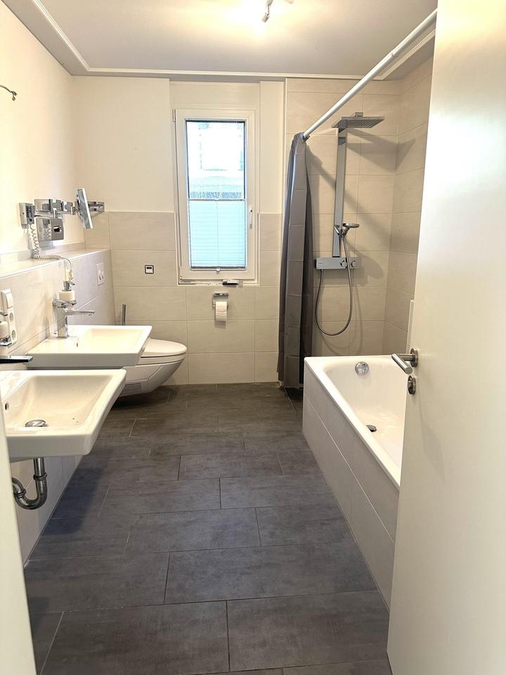 Bezugsfertige moderne Erdgeschosswohnung mit Garten und hochwertige Ausstattung – Bild 15