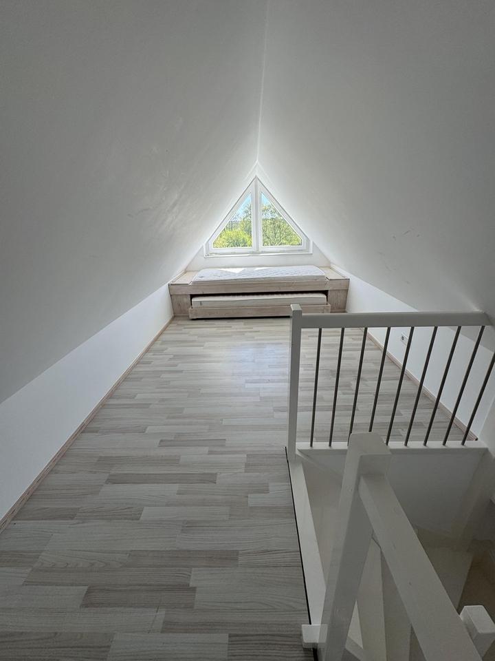 Charmantes Einfamilienhaus mit Einliegerwohnung, Fußbodenheizung und großem Garten – Bild 10