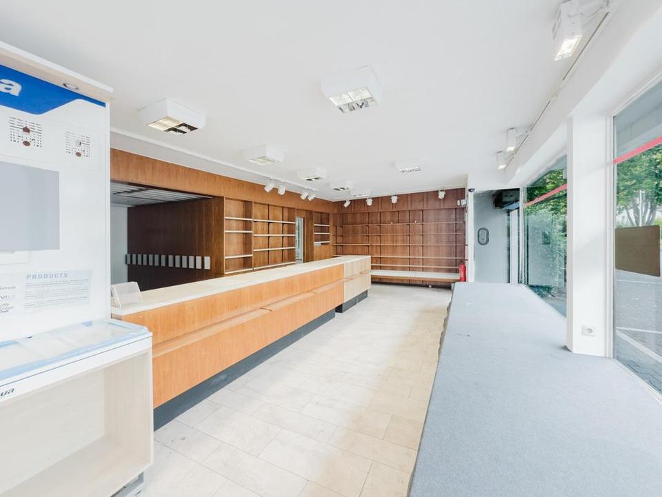 115 m² Ladenlokal (ehem. Apotheke) im EG + 87 m² Lager im Keller – Bild 4