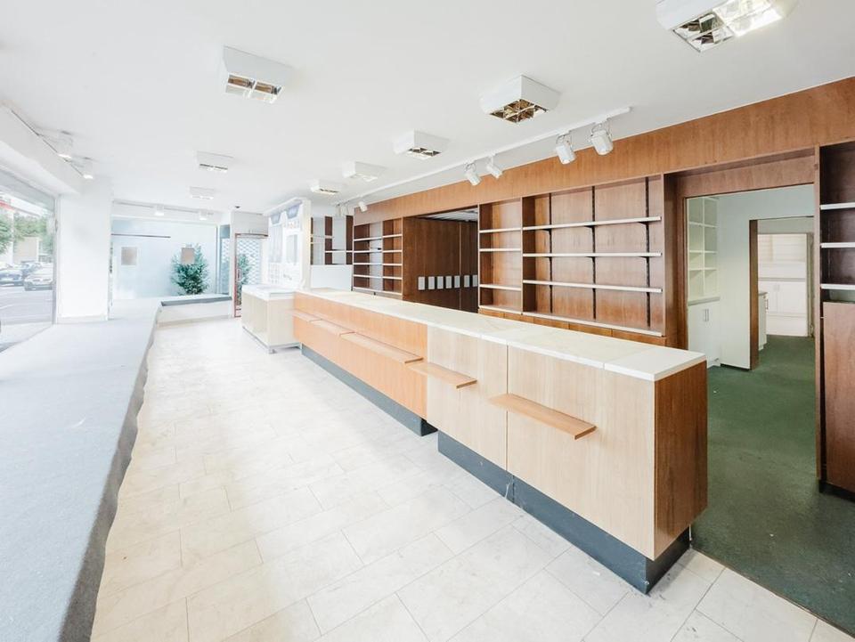 115 m² Ladenlokal (ehem. Apotheke) im EG + 87 m² Lager im Keller – Bild 3