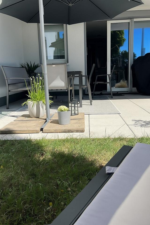 Top ausgestattete neuwertige 3-Zimmer-Erdgeschosswohnung – Bild 2