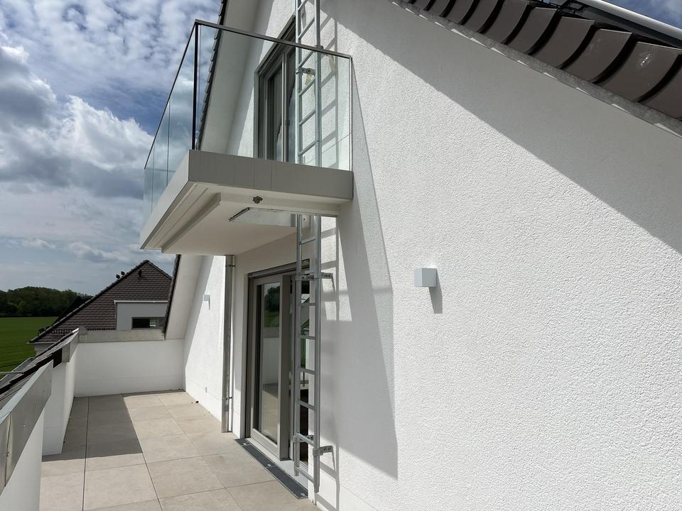 2 1/2 Zimmer Maisonette mit niedrigen Nebenkosten und 2 Dachterrassen – Bild 2