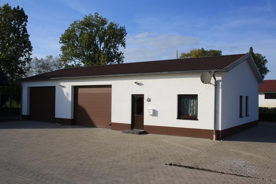 Großzügiges Einfamilienhaus mit Betriebshalle 10x18m – Bild 11