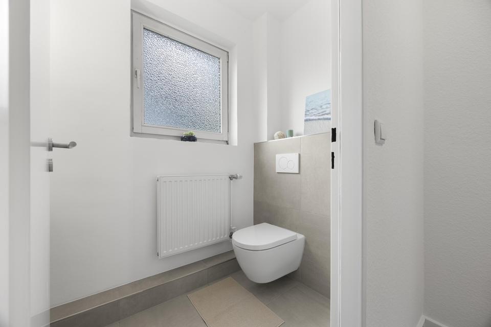 Seltene Gelegenheit – frisch renovierte 4-Zimmer-Wohnung mit Südterrasse & Gartenanteil – Bild 9