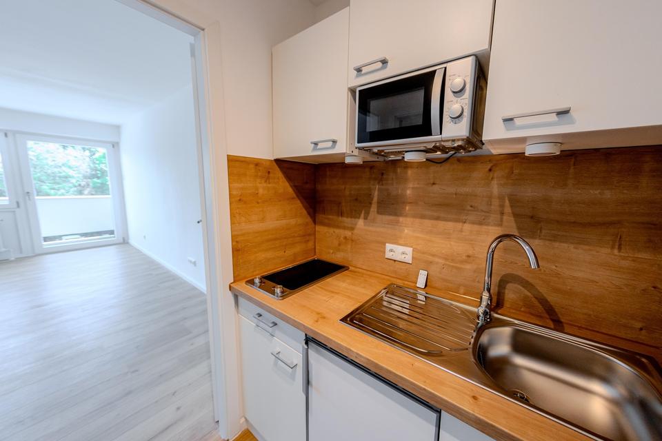 NEU renovierte Wohnung Kurzone 1 mit Balkon und TG Stellplatz – Bild 10