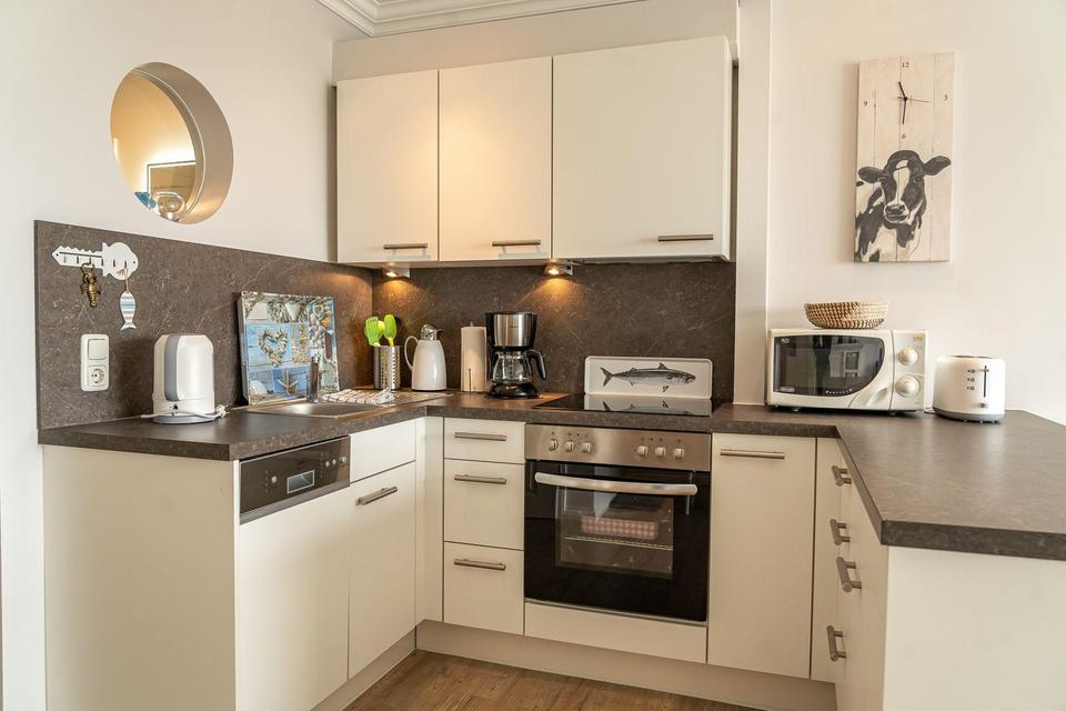 Sonnige 2-Zimmer Ferienwohnung mit Meerblick – Bild 11