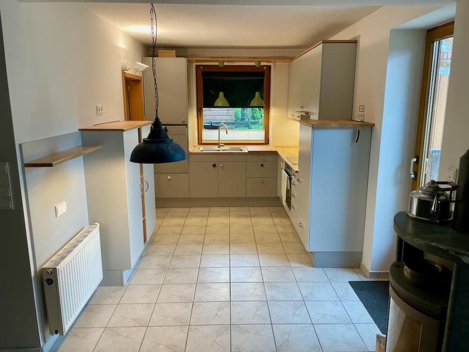 Nachhaltiger Bungalow mit Wintergarten, Garage und Garten – Bild 8