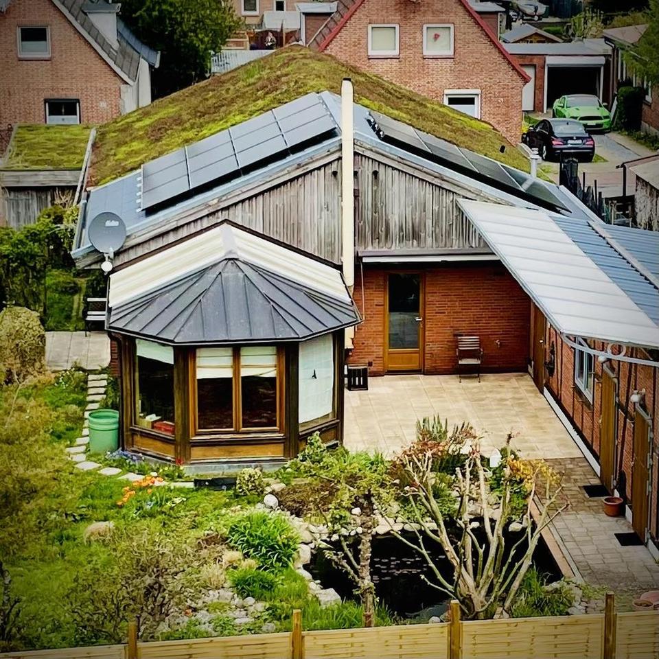 Nachhaltiger Bungalow mit Wintergarten, Garage und Garten