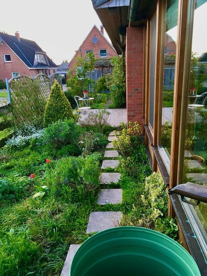 Nachhaltiger Bungalow mit Wintergarten, Garage und Garten – Bild 12