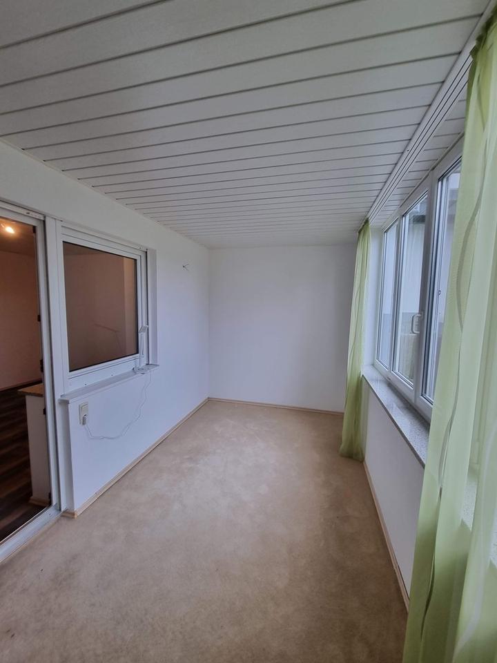 2-Zimmer Erdgeschosswohnung mit großem Wohnbereich, offener Küche und Garage – Bild 15