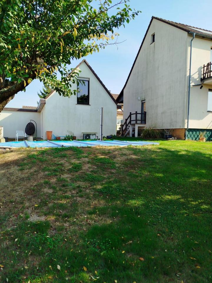 Gepflegtes Einfamilienhaus mit Nebengebäude und beheizbarem Pool – Bild 4