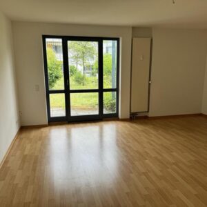 1-Zimmer-Apartment mit Grünanlage und Garage