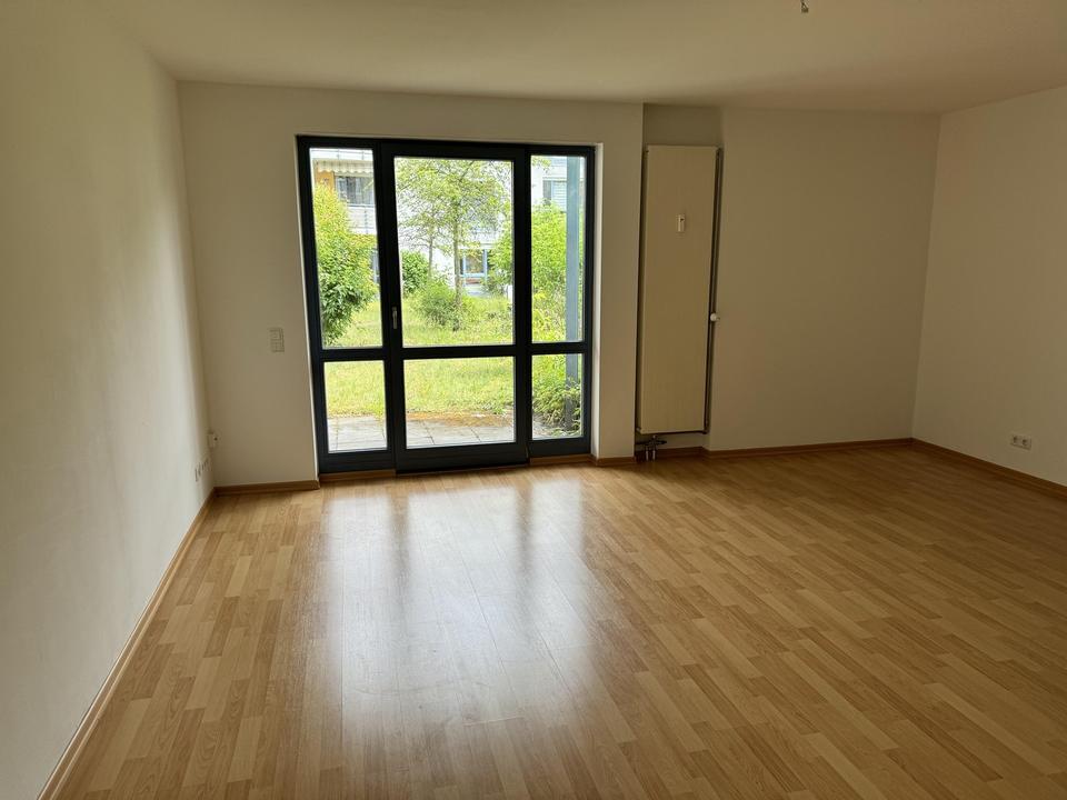1-Zimmer-Apartment mit Grünanlage und Garage