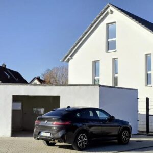 Luxus Einfamilienhaus mit Einliegerwohnung, Garage, Terrasse und großem Grundstück