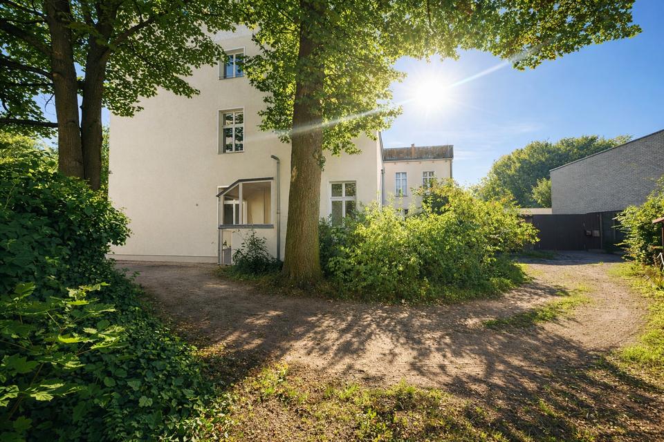 Herrschaftliche Hochparterrewohnung mit Terrasse, Kamin, Carport, in ruhiger Lage – Bild 19