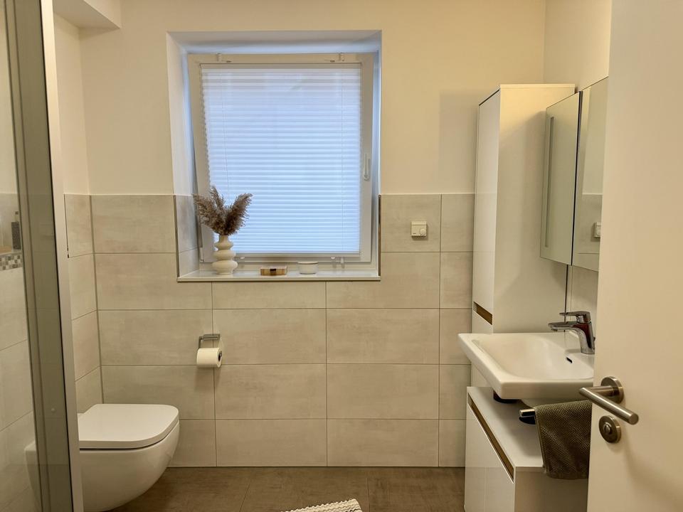 Moderne 2-Zimmer-Neubauwohnung mit Balkon & Tiefgarage in zentraler Lage von Pinneberg – Bild 8