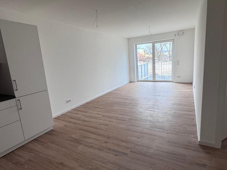 Besondere 2-Zimmer mit Einbauküche und Balkon im NEUBAU – Bild 2