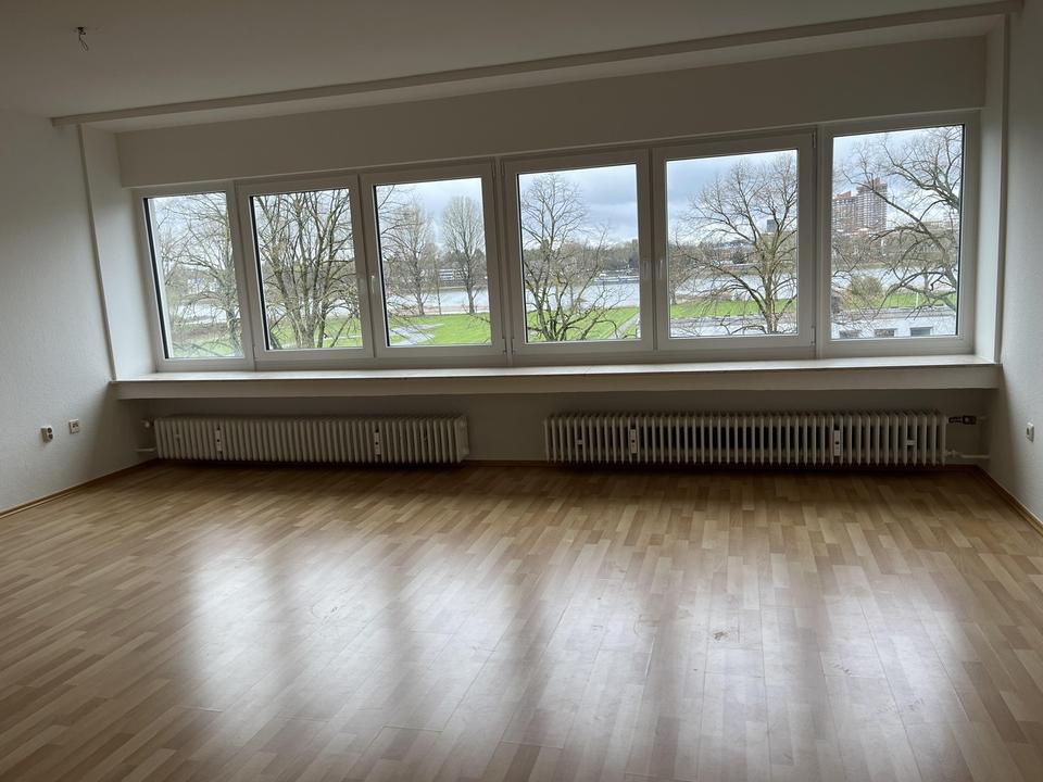 Wohnung mit exklusivem Rheinblick und Einzelgarage + Stellplatz