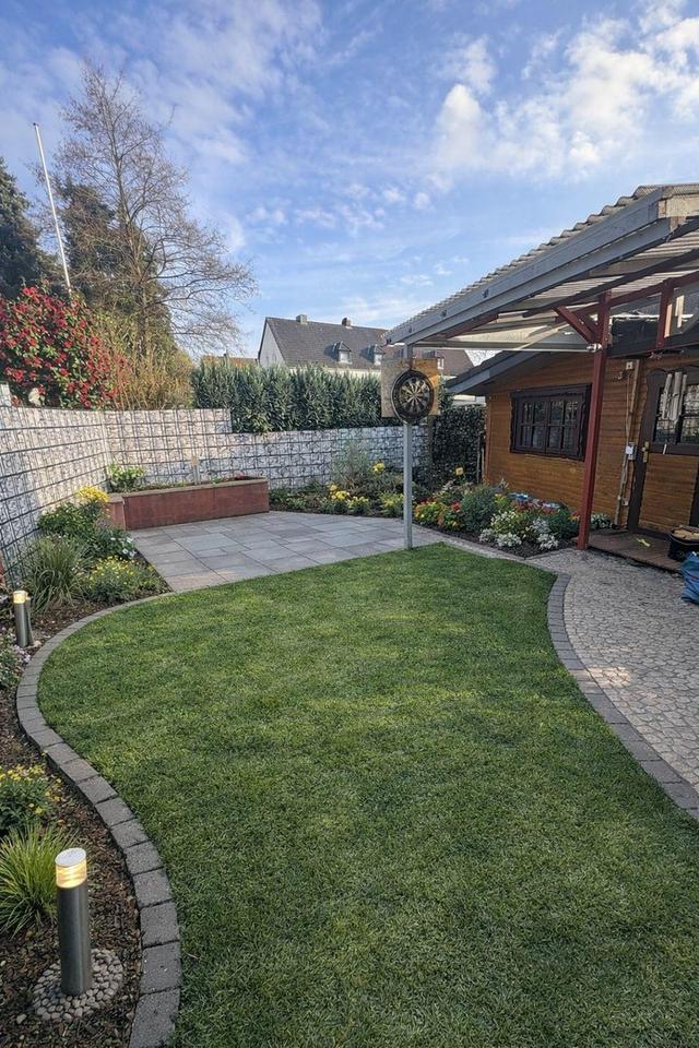 Großzügige 4-Zimmer-Wohnung (112 m²) mit Garten, Garage mit Wallbox, Kamin & Einbauküche – Bild 14