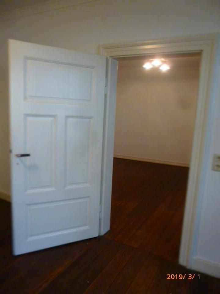 Charmante 2-ZKB mit Holzdielen, Freisitz und Innenhof – Bild 3