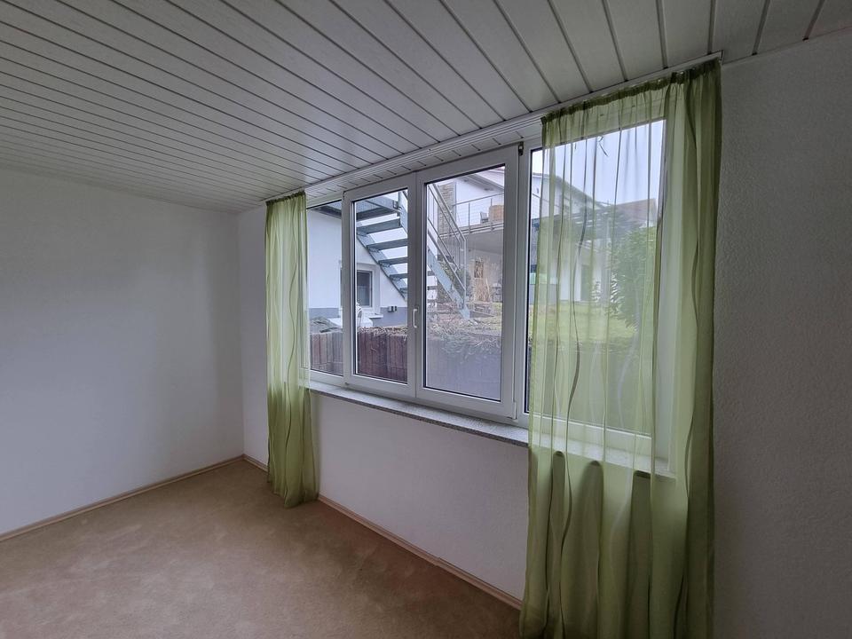 2-Zimmer Erdgeschosswohnung mit großem Wohnbereich, offener Küche und Garage – Bild 14
