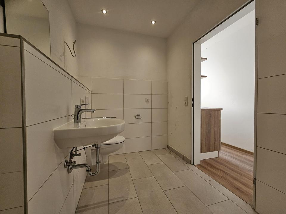 Charmante 1-Zimmer-Wohnung in zentraler Lage mit lichtdurchflutetem Wohnbereich – Bild 7