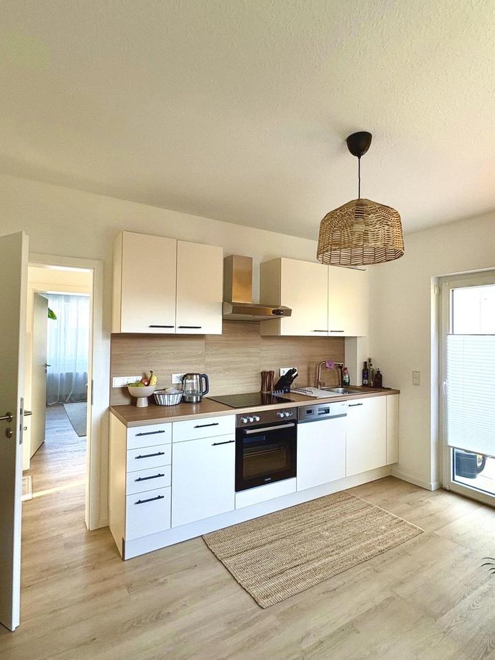 Moderne 3-ZKB-Wohnung mit Gartenzugang und schöner Raumaufteilung – Bild 5