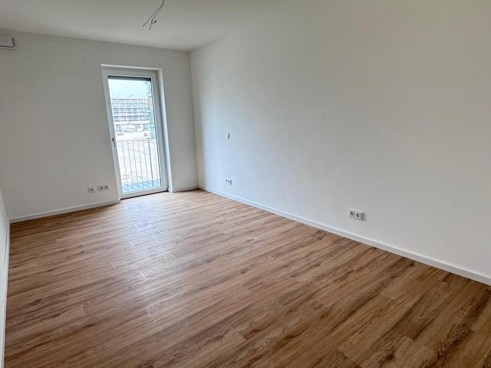 Besondere 2-Zimmer mit Einbauküche und Balkon im NEUBAU – Bild 4