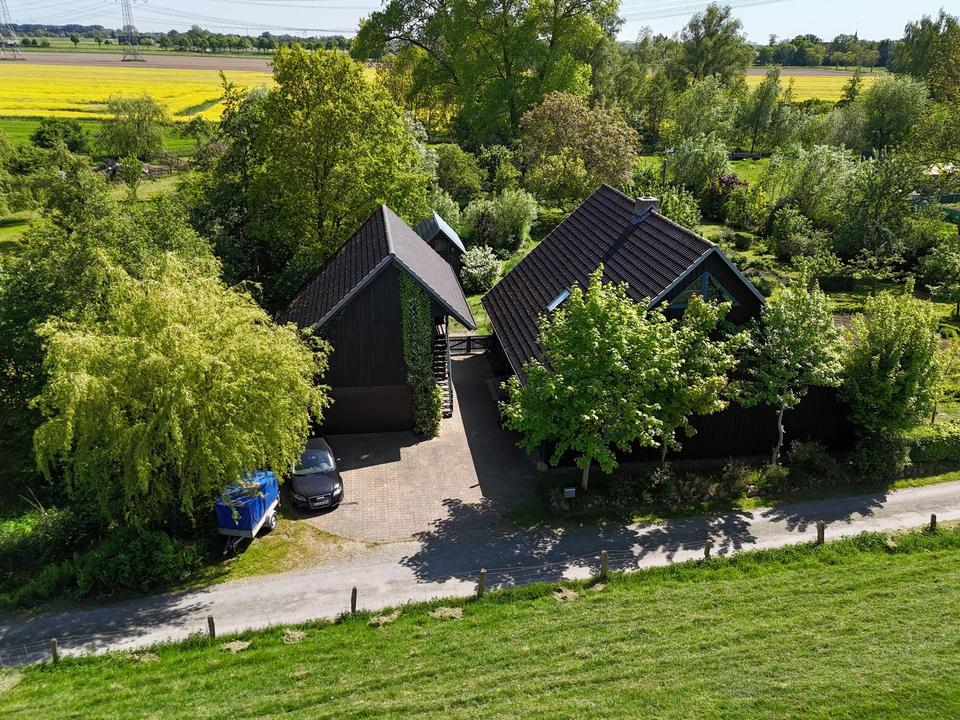 Ökologisch gebautes Holzhaus mit großem Nebengebäude – Bild 5