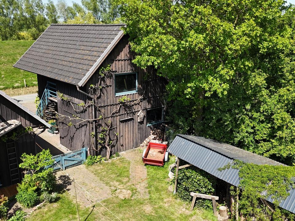 Ökologisch gebautes Holzhaus mit großem Nebengebäude – Bild 7